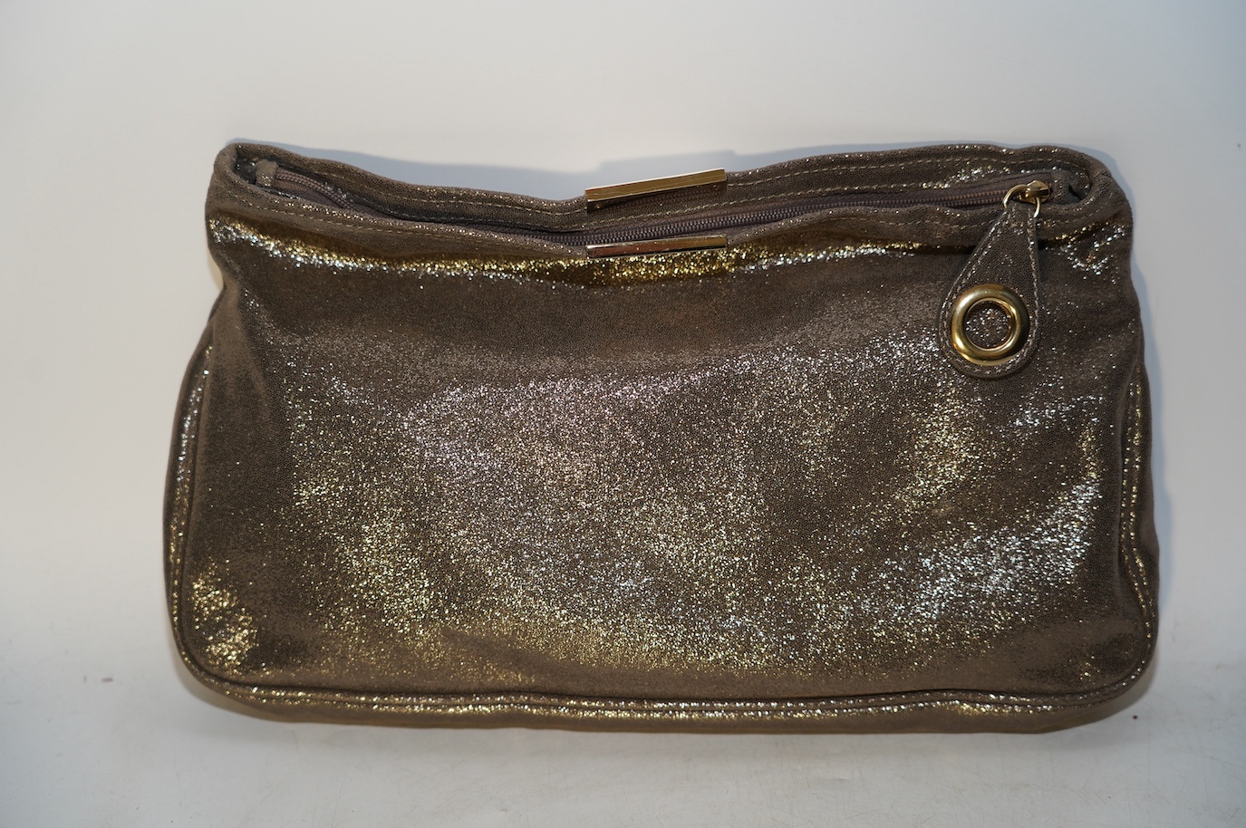 A Jimmy Choo metallic gold clutch bag, with dust bag